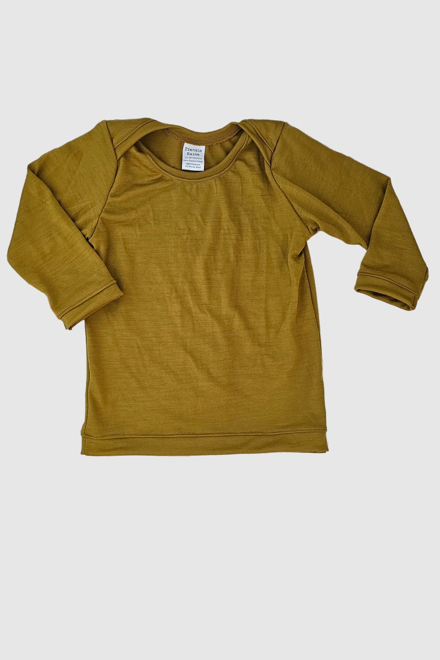Lemongrass merino baby long sleeve tee, product shot on white background.