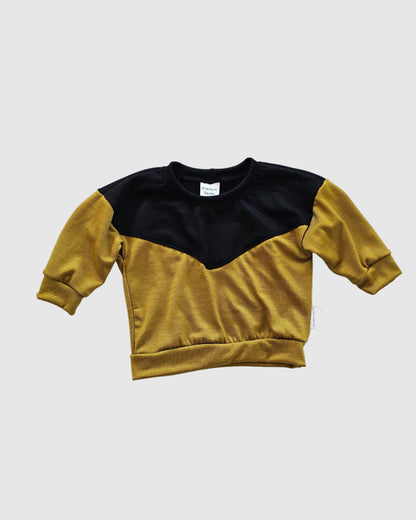 Merino Riley Crew in Lemongrass and Black, flat lay on white background.