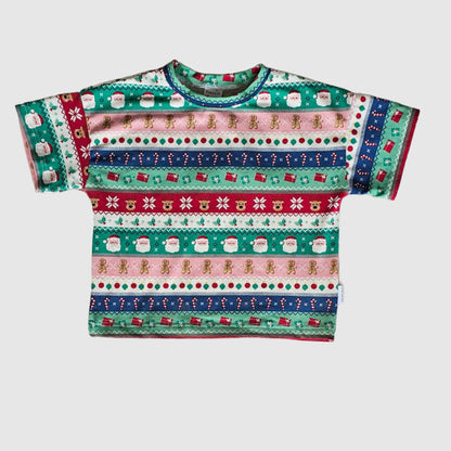 Colorful patterned fabric on a textured surface