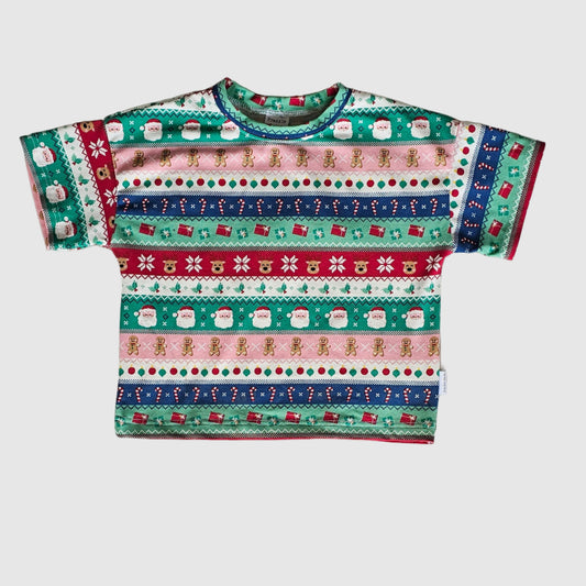 Colorful patterned fabric on a textured surface